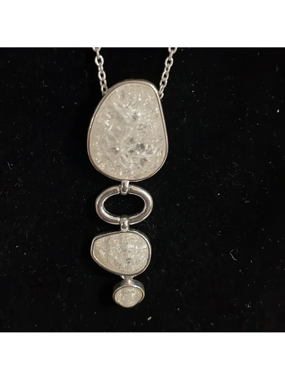 Avon White triple stone pendant with silver tone chain and removable extender